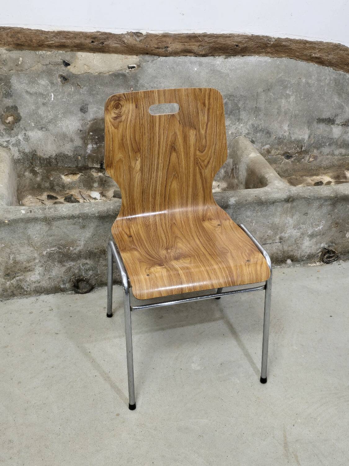 1960s chair in curved plywood on stainless steel base