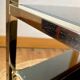 Gold metal side table, in the style of Maison Jansen, 1970s.