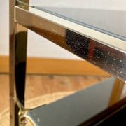Gold metal side table, in the style of Maison Jansen, 1970s.
