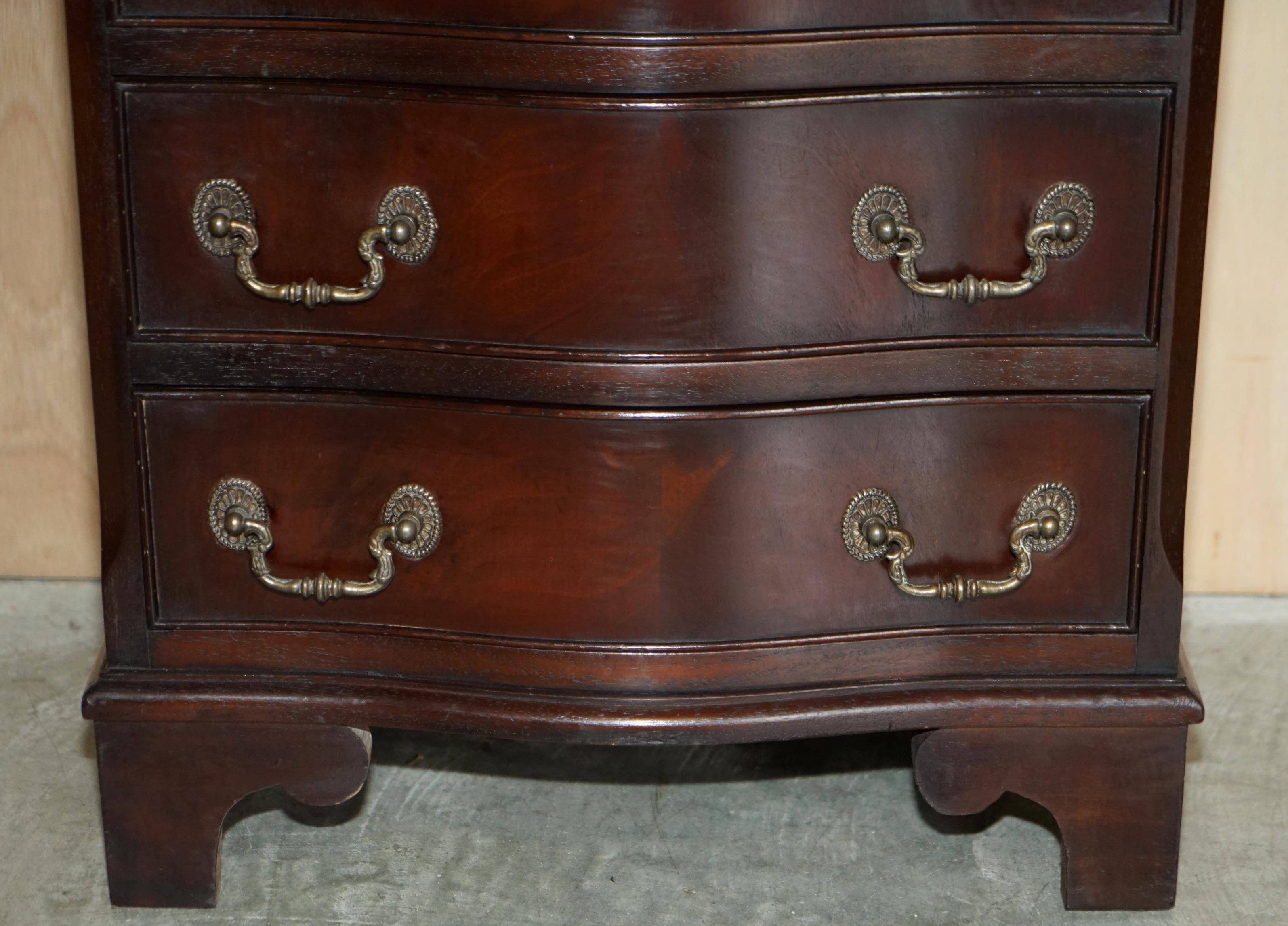 Vintage serpentine front hardwood chest of drawers