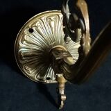 Brass wall lamp with speckled glass tulip