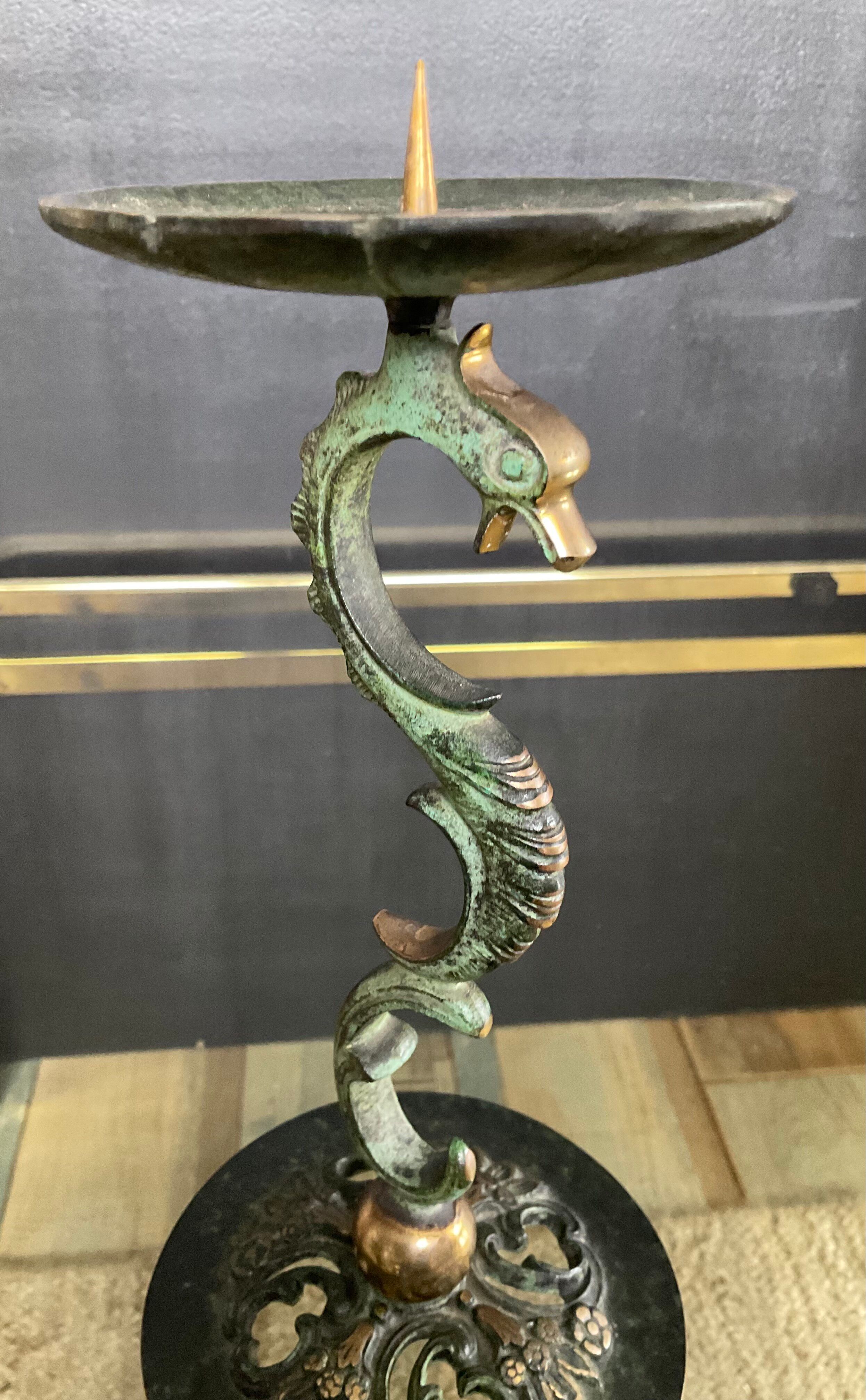 Empire style bronze candlestick with a candle holder