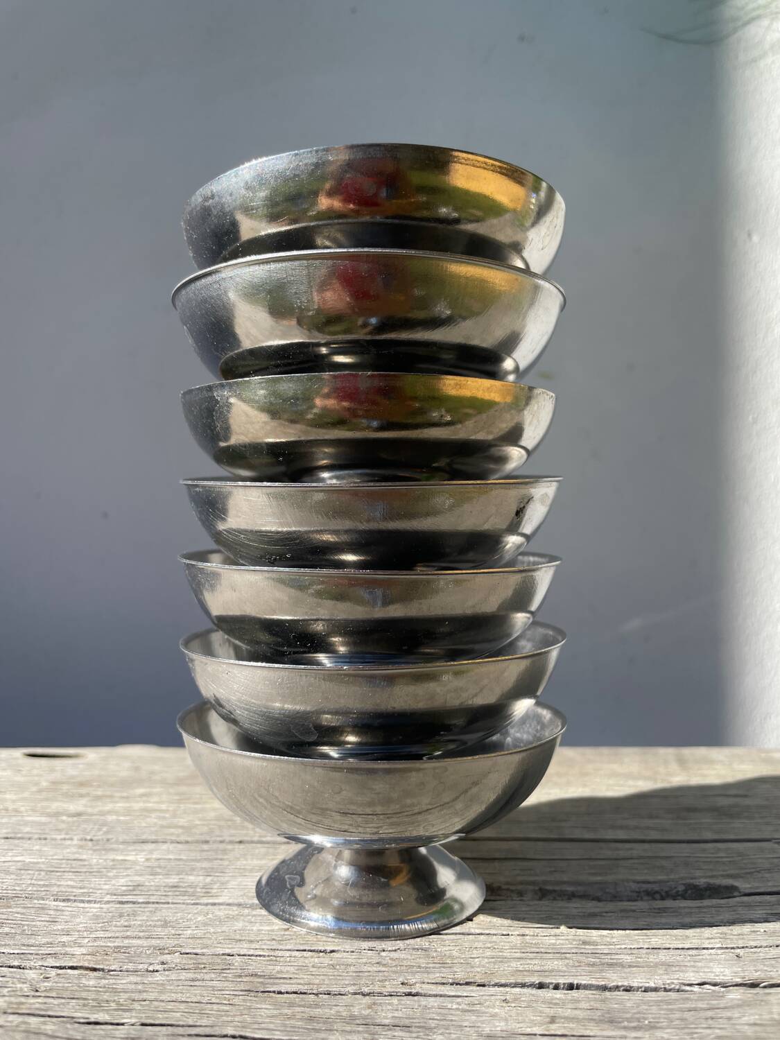 7 stainless steel cups 1970