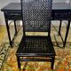 Office with its rattan armchair and brown leather braiding, italian design
