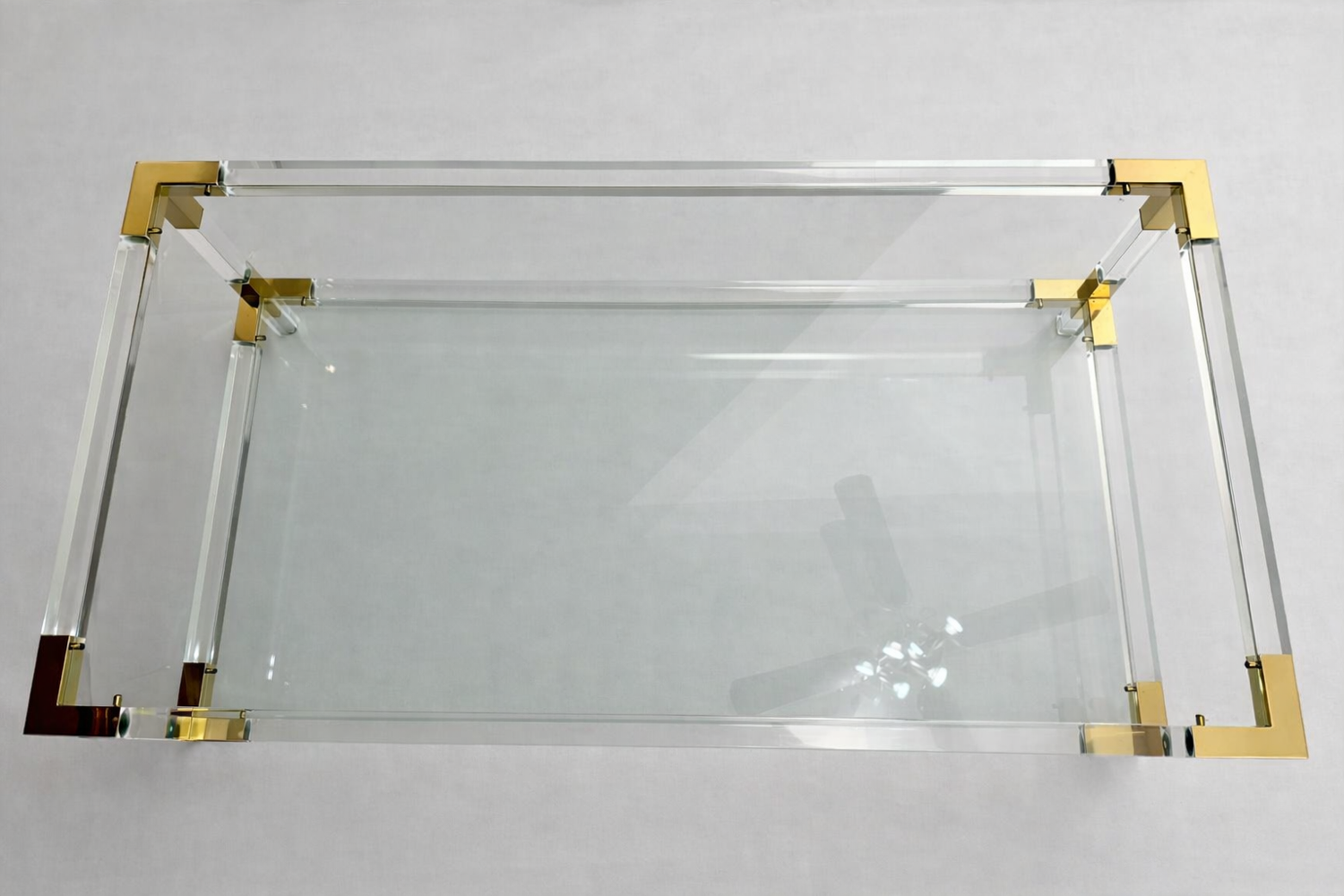 Italian coffee table Fabian, glass, plexiglass and brass, 1970-80.