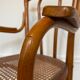 Old thonet armchair in curved wood and rattan cane