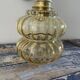 Vintage wall lamp in gilded chiseled glass