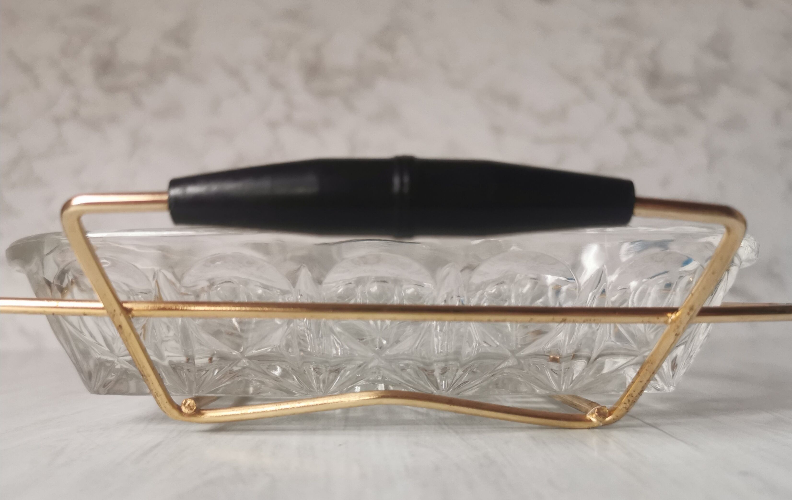 Tray with glass and gold metal compartments