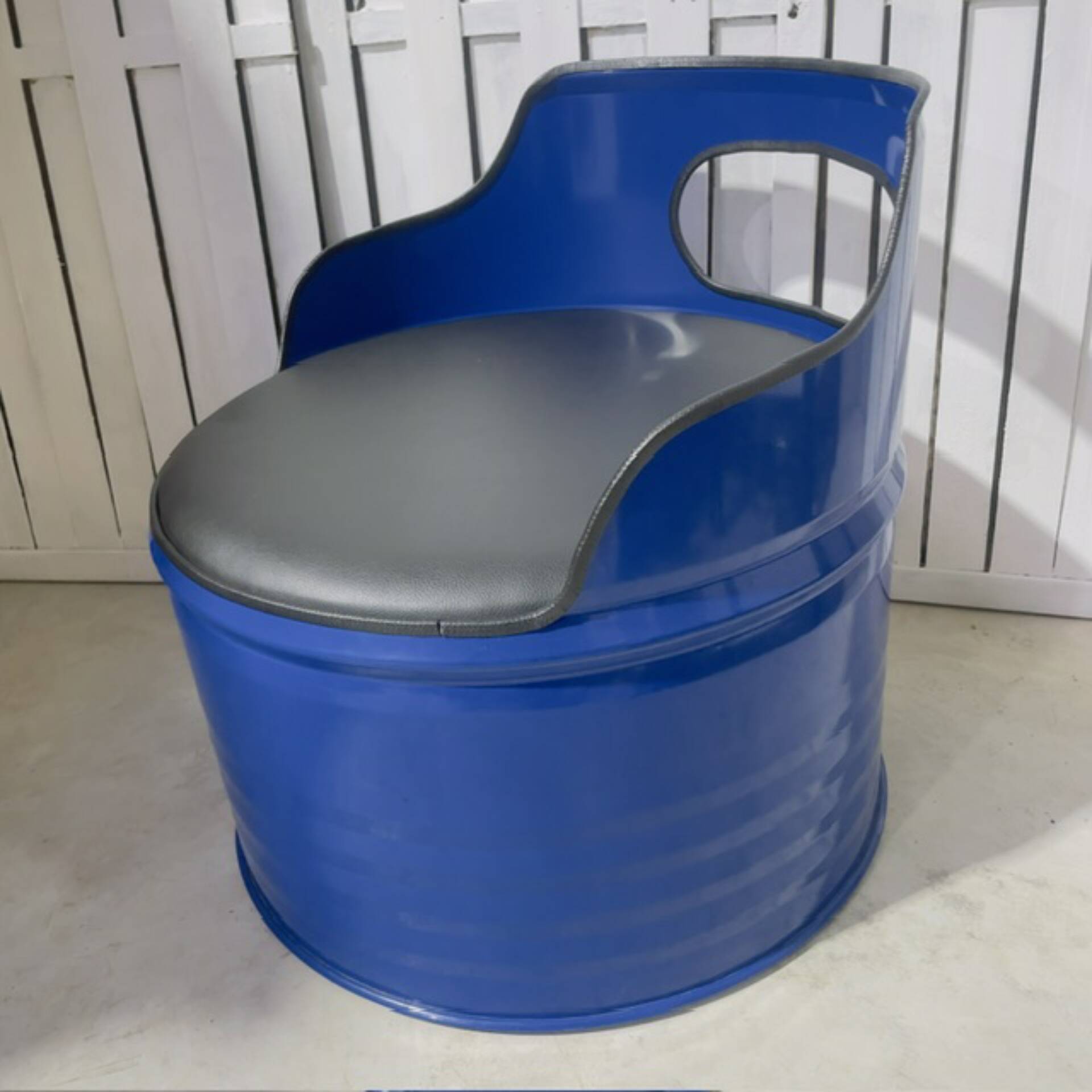 Vintage blue stool, comfortable and full of character.