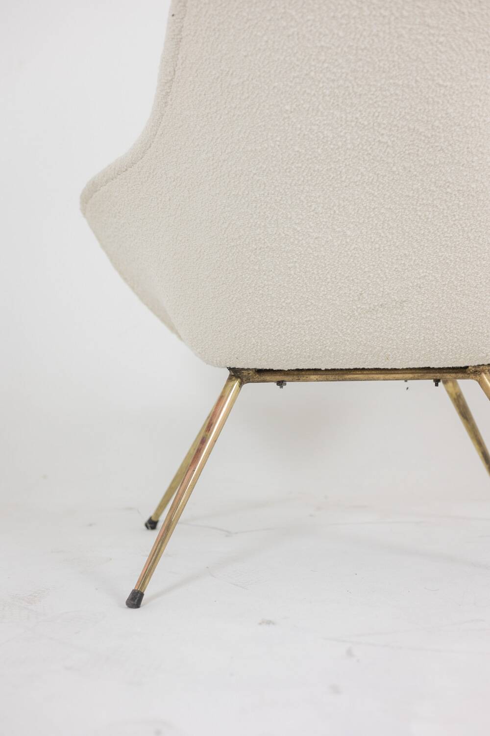 Pair of cocktail armchairs in gilded brass. 1960s.