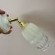 Vintage globe wall lamp in half frosted, half transparent glass