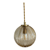 Baladeuse avec globe vintage en verre ambré
