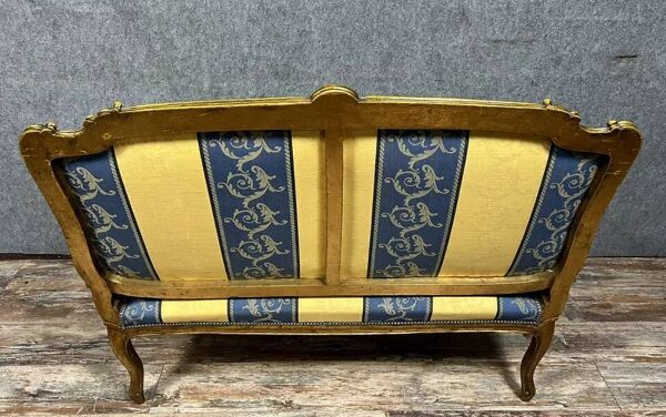 Banquette de style Louis XV en bois doré époque XXème siècle