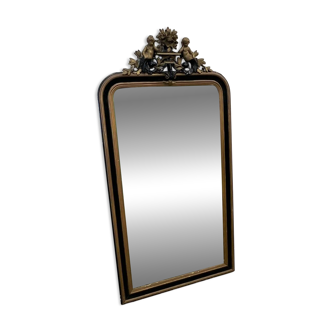 Miroir ancien noir et or des années 1800 avec cupidon, France des années 1800.