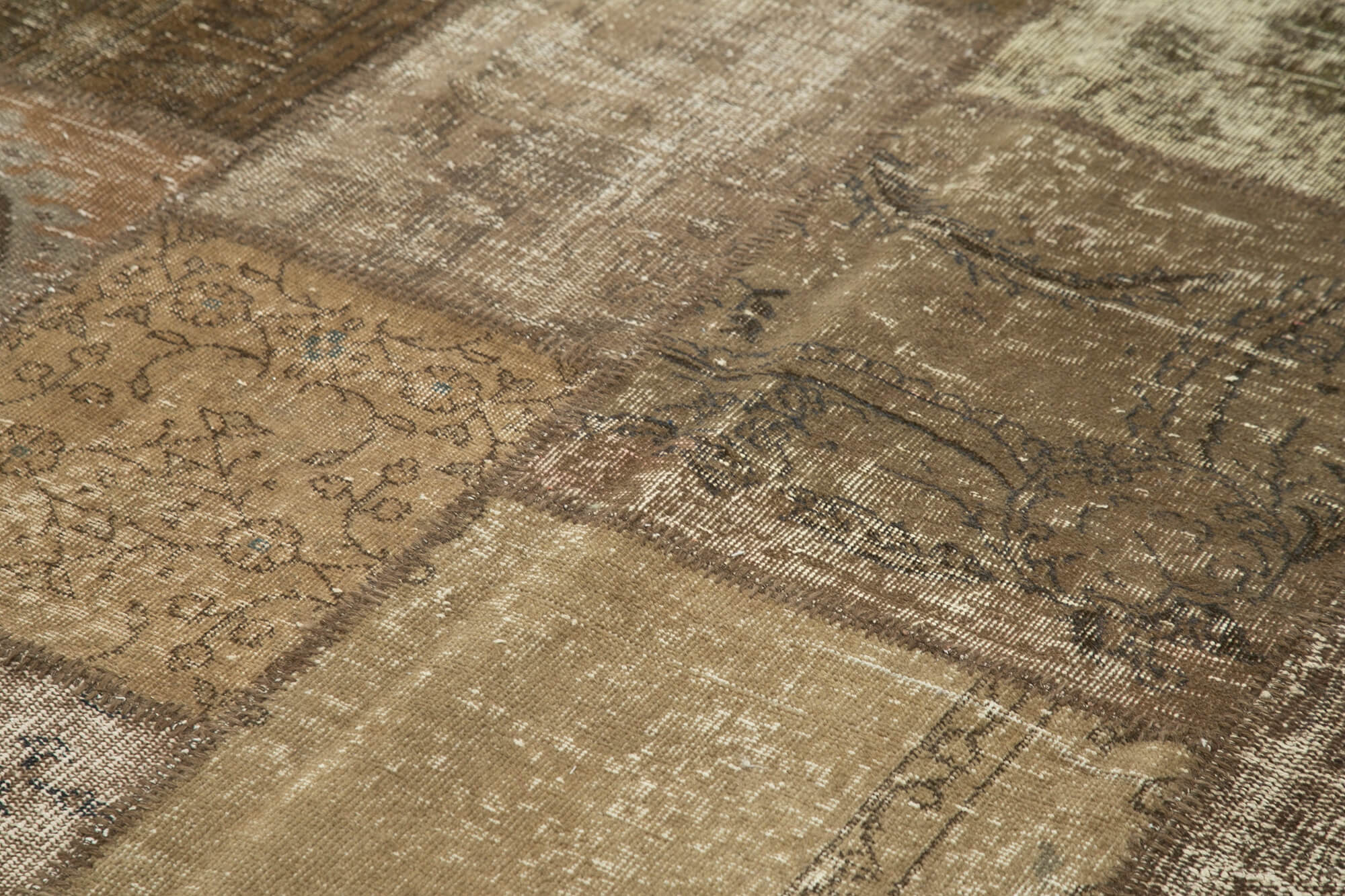 Handwoven oriental overdyed 196 cm x 304 cm brown patchwork carpet