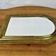 Vintage golden half-moon mirror