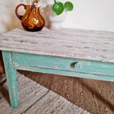 Wooden farmhouse coffee table green base