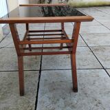 Vintage coffee table from the 1950s reconstruction, wood and glass.
