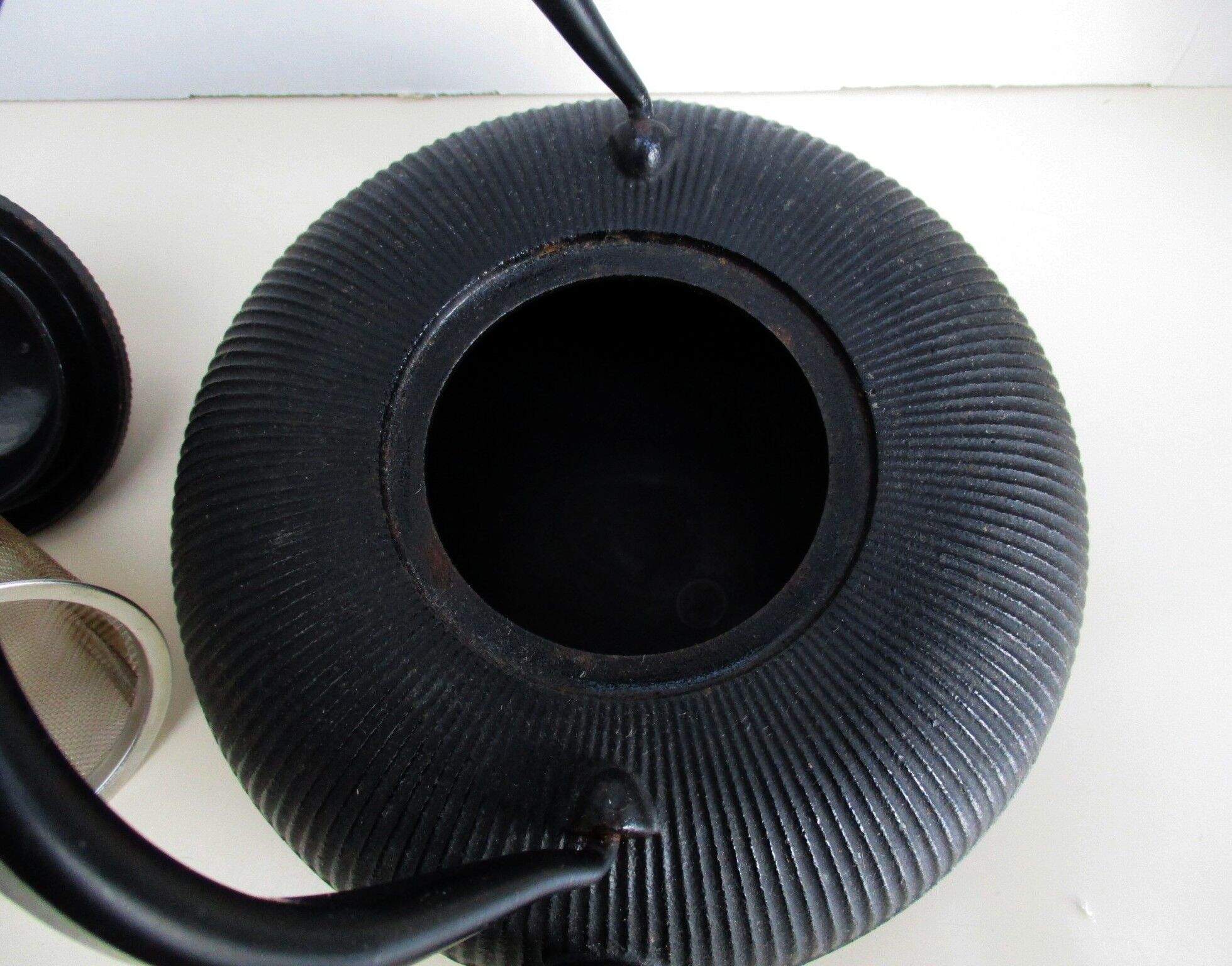 Asian teapot in black cast iron