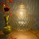 Suspension globe vintage en verre ambré