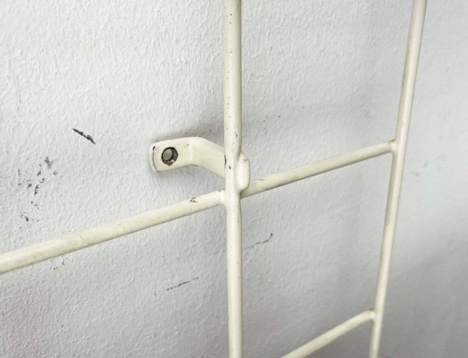 Minimalist white wire coat rack from mid-century Germany, 1960s.