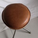 Vintage rotating stool seated in leather and chrome legs