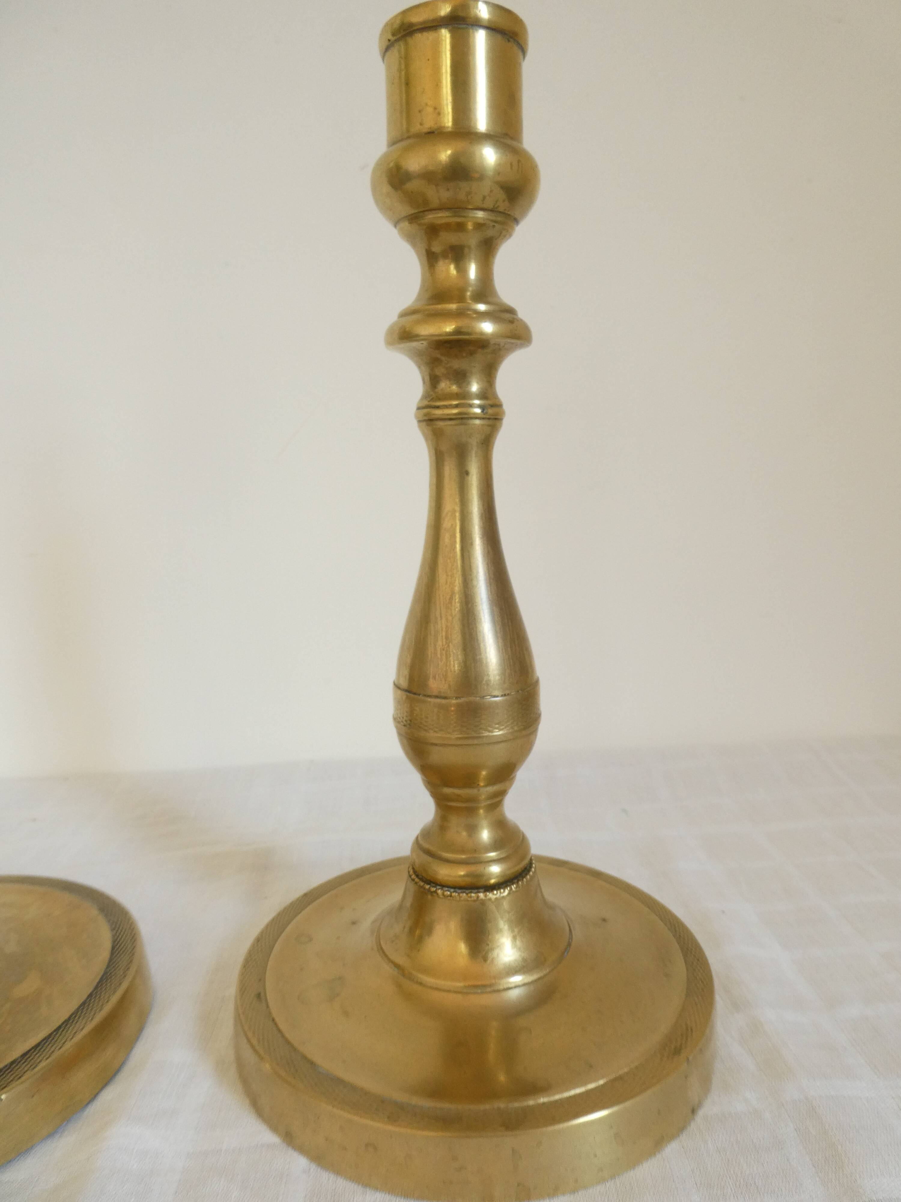 Pair of bronze candlesticks from the Restoration period, circa 1820