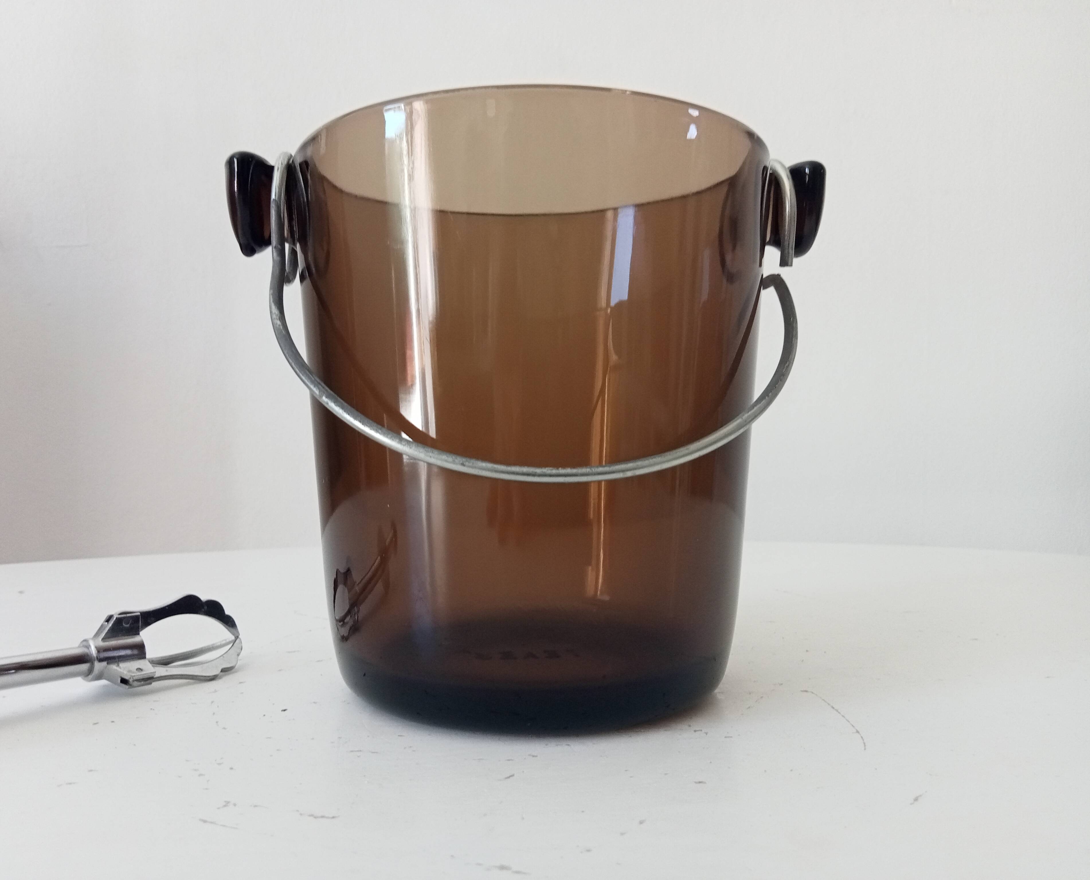 Vintage 1970s ice bucket and tongs.