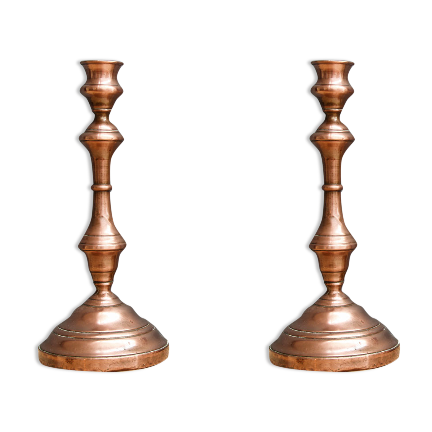 Paire de bougeoirs anciens, en cuivre