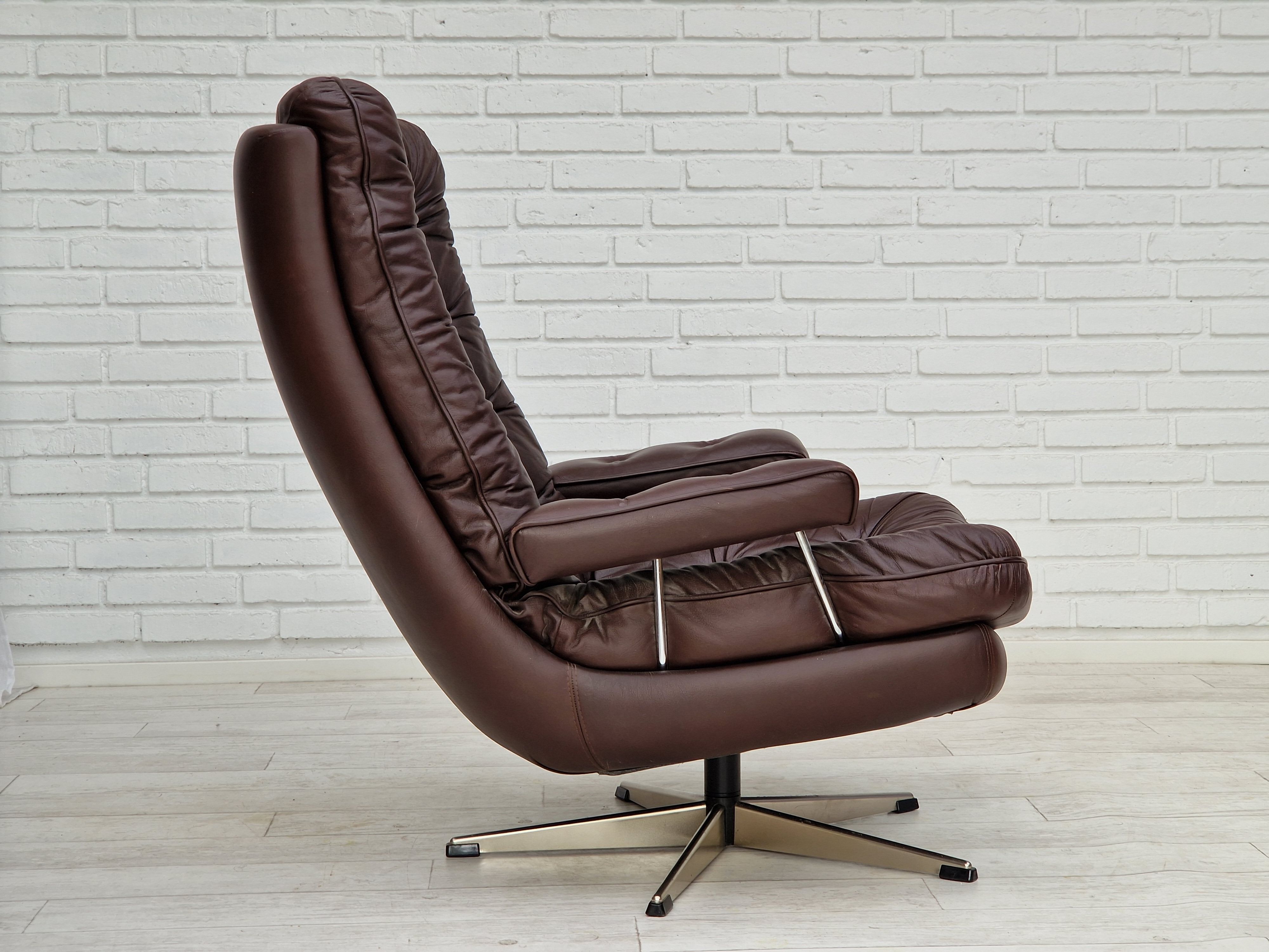 Vintage danish swivel leather armchair 1970s