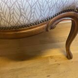 office armchair in walnut, nineteenth century, fully trimmed and reupholstered.