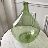 Old lady-jeanne in green glass