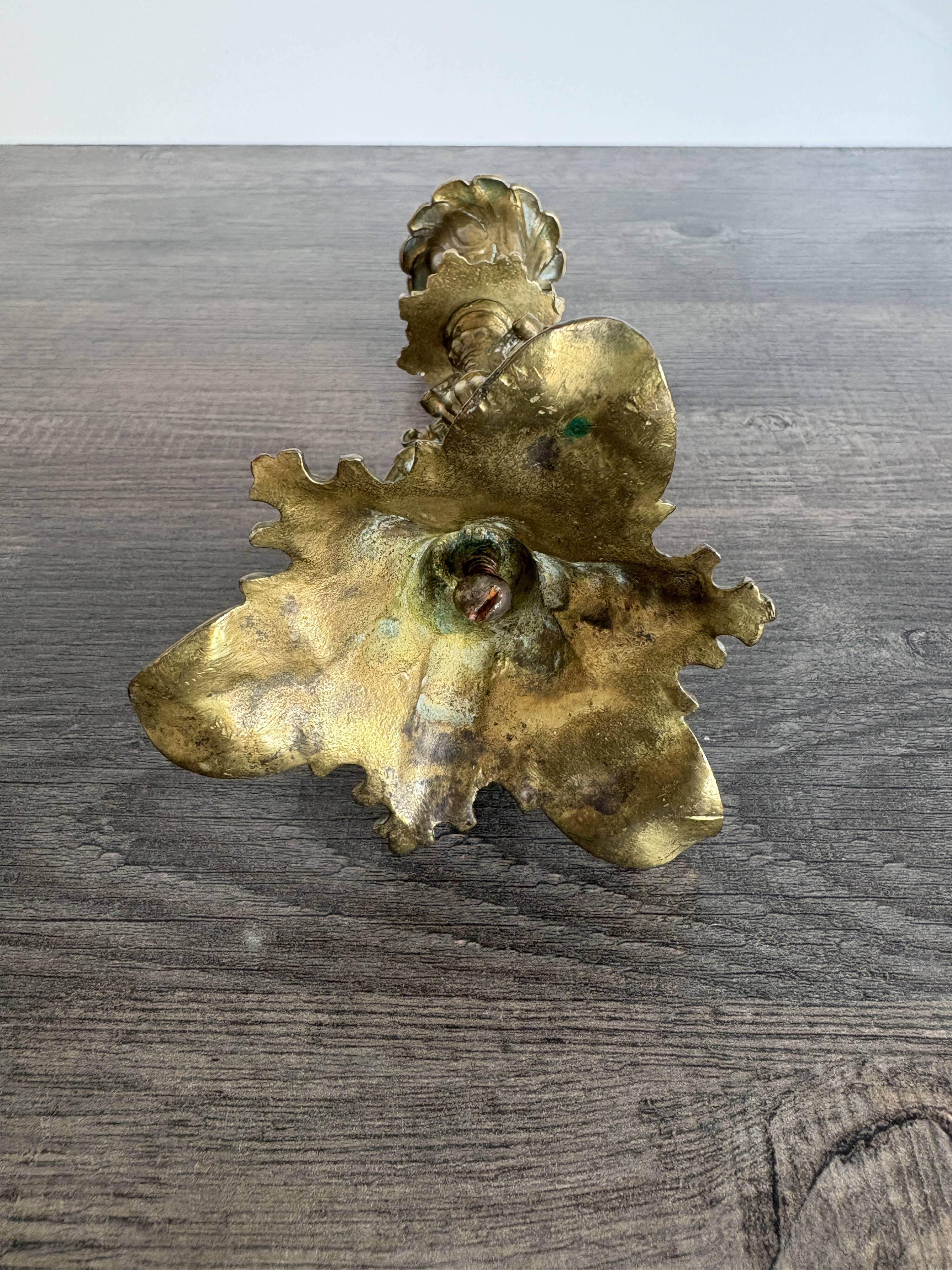 Antique chiselled bronze candlestick