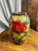 Vase en terre cuite au décor floral