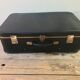 Old black suitcase with reinforcements & vintage bakelite handleOld suitcase black travel trunk + backup & handle bakelite vintage