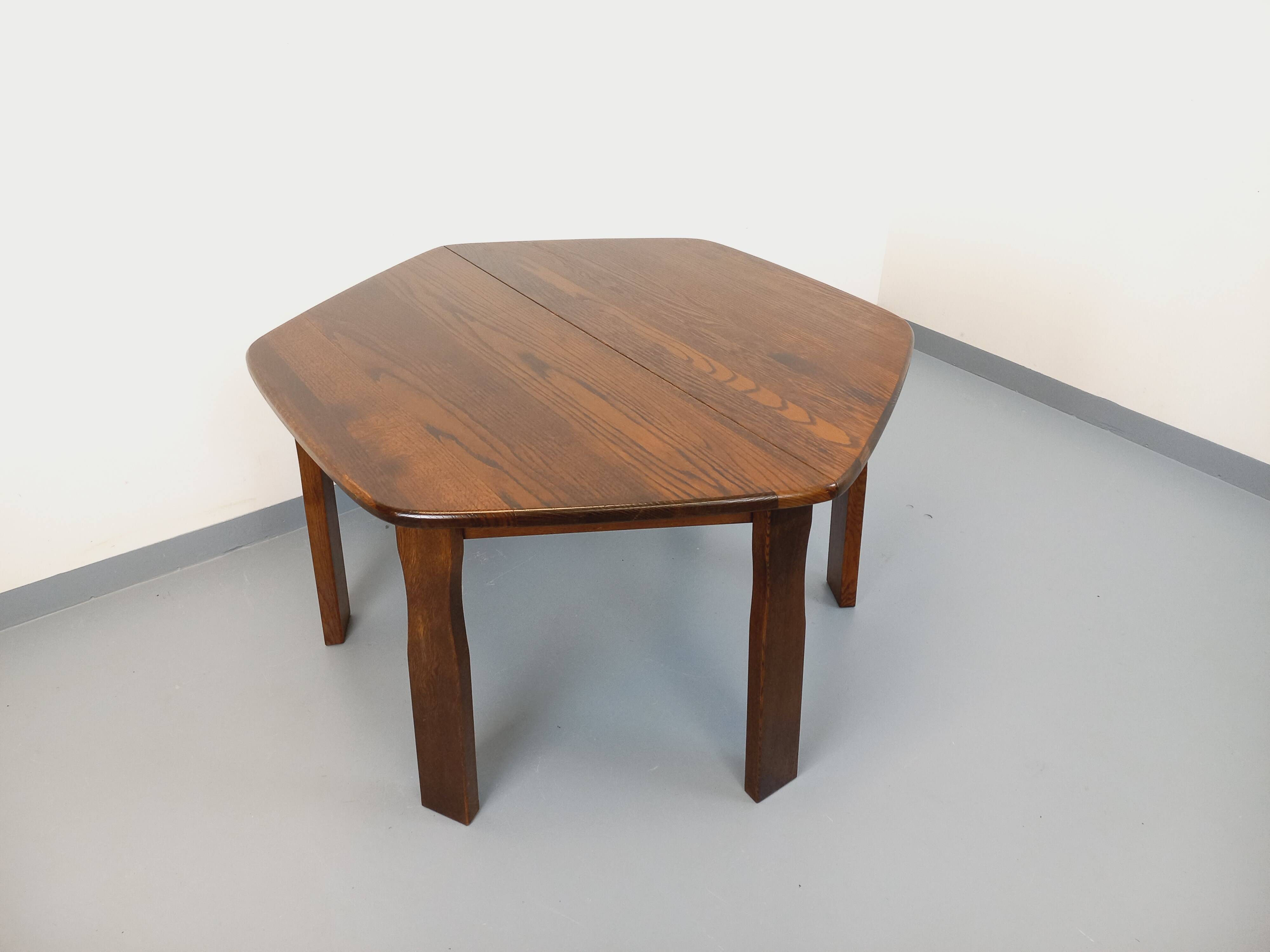 Vintage brutalist hexagonal dining table made of oak from the 1950s.
