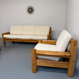 Set of 2 armchairs in solid pine with boucle fabric, 1970s Scandinavian design.