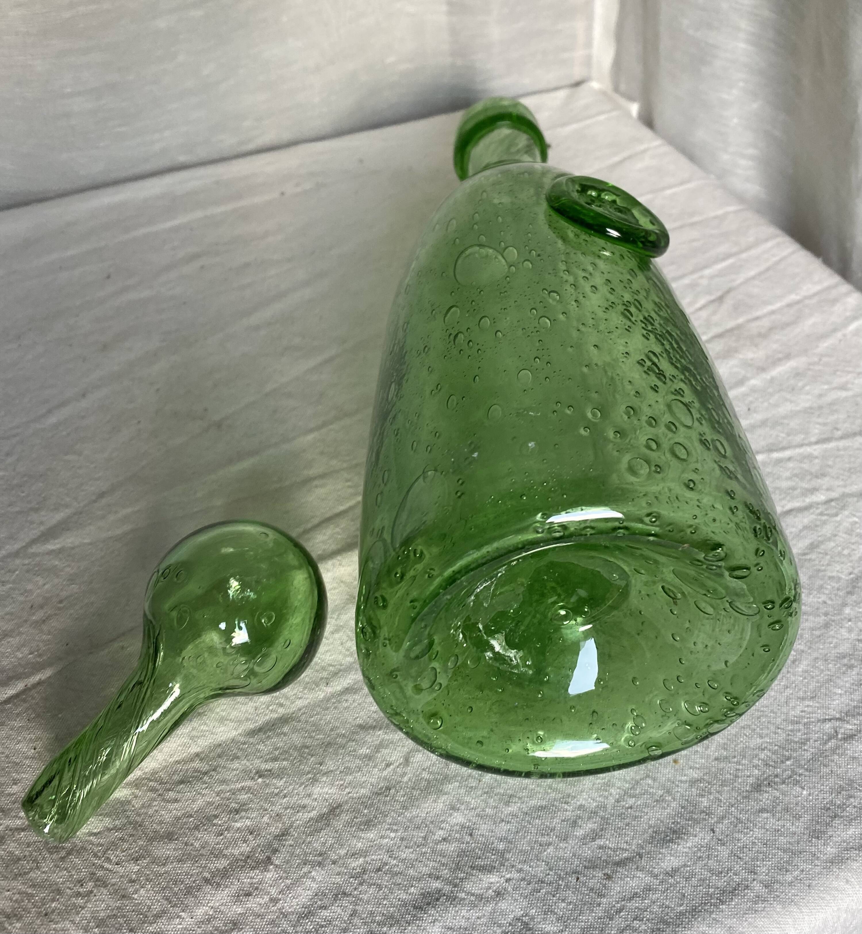 Biot-signed bubble glass bottle, green carafe