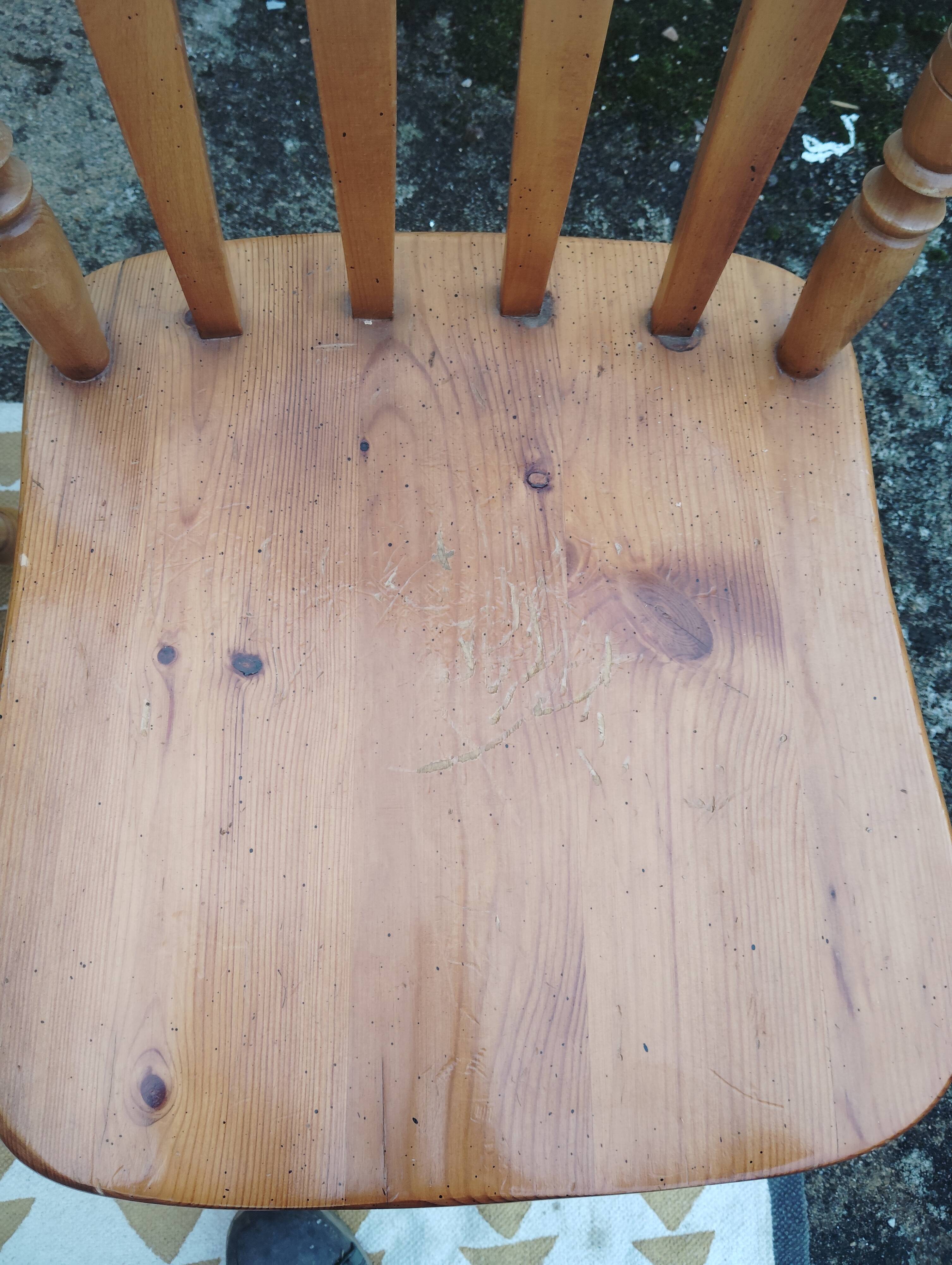 Set of 6 western bistro chairs, including 2 with armrests.