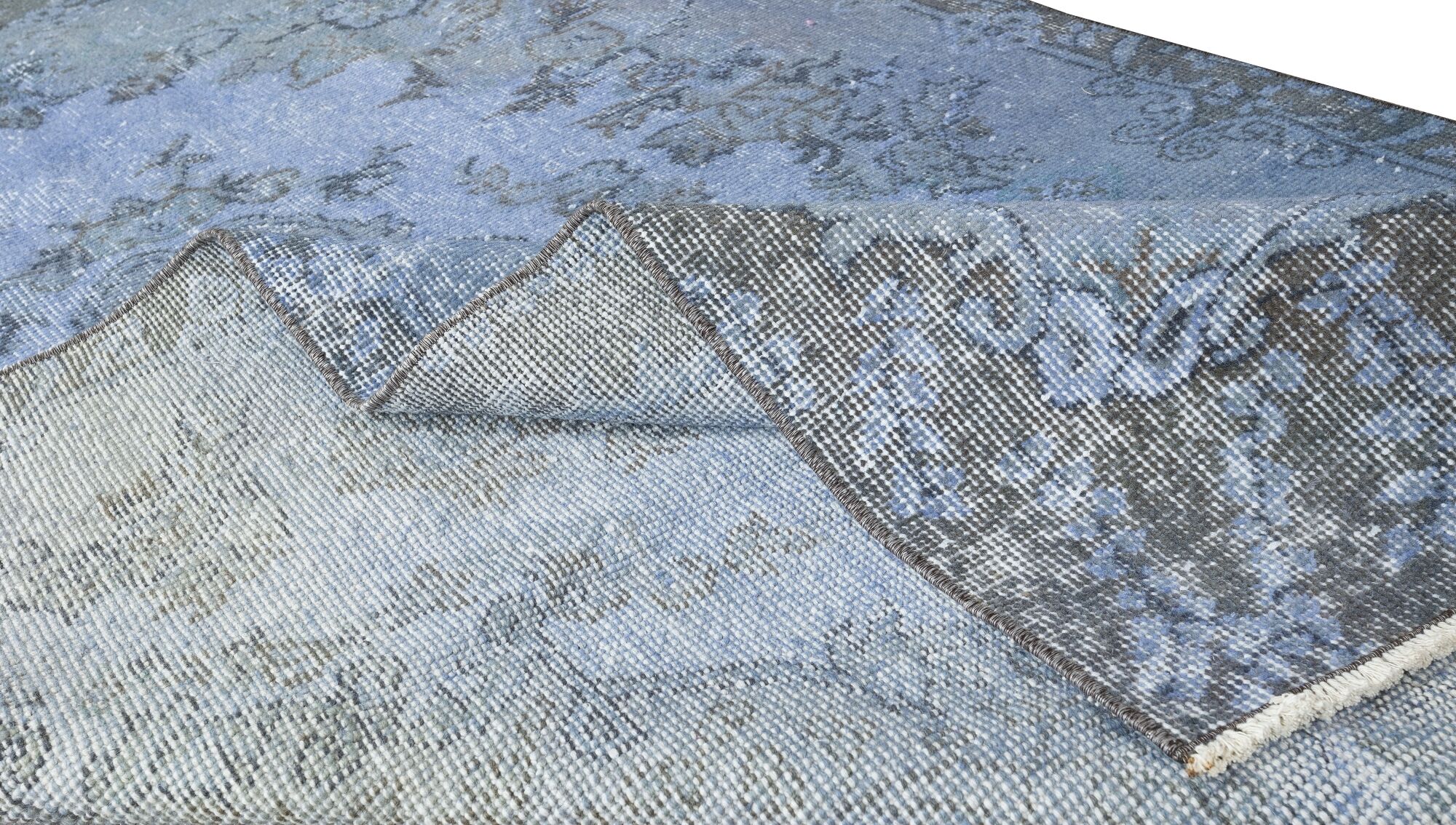 Hand-knotted turkish rug over-dyed in light blue