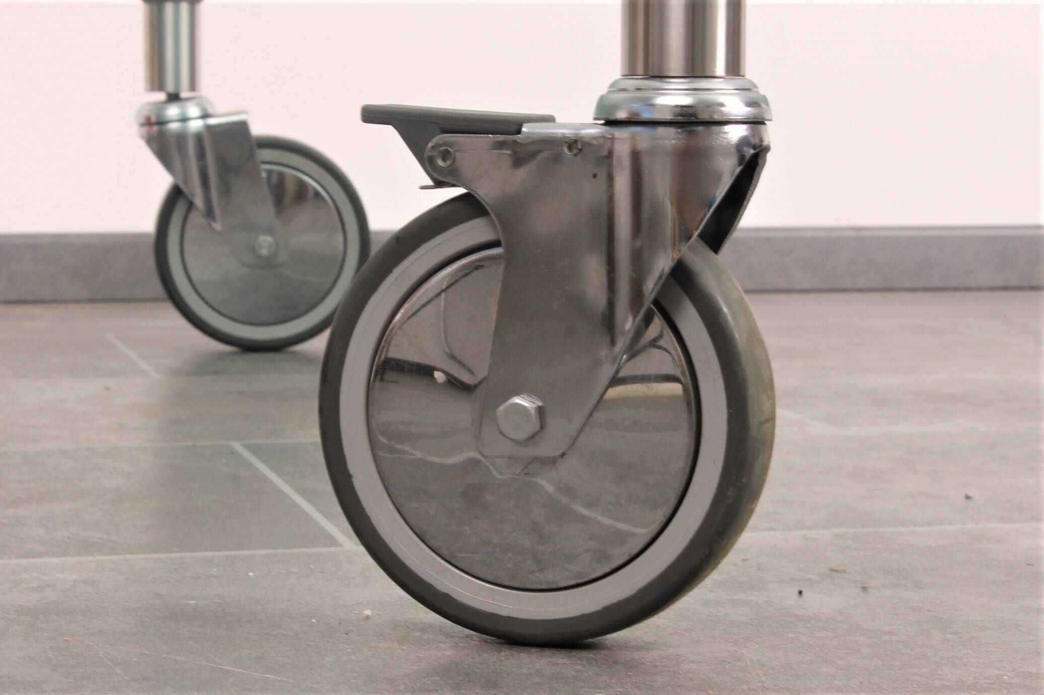 Wheeled glass coffee table