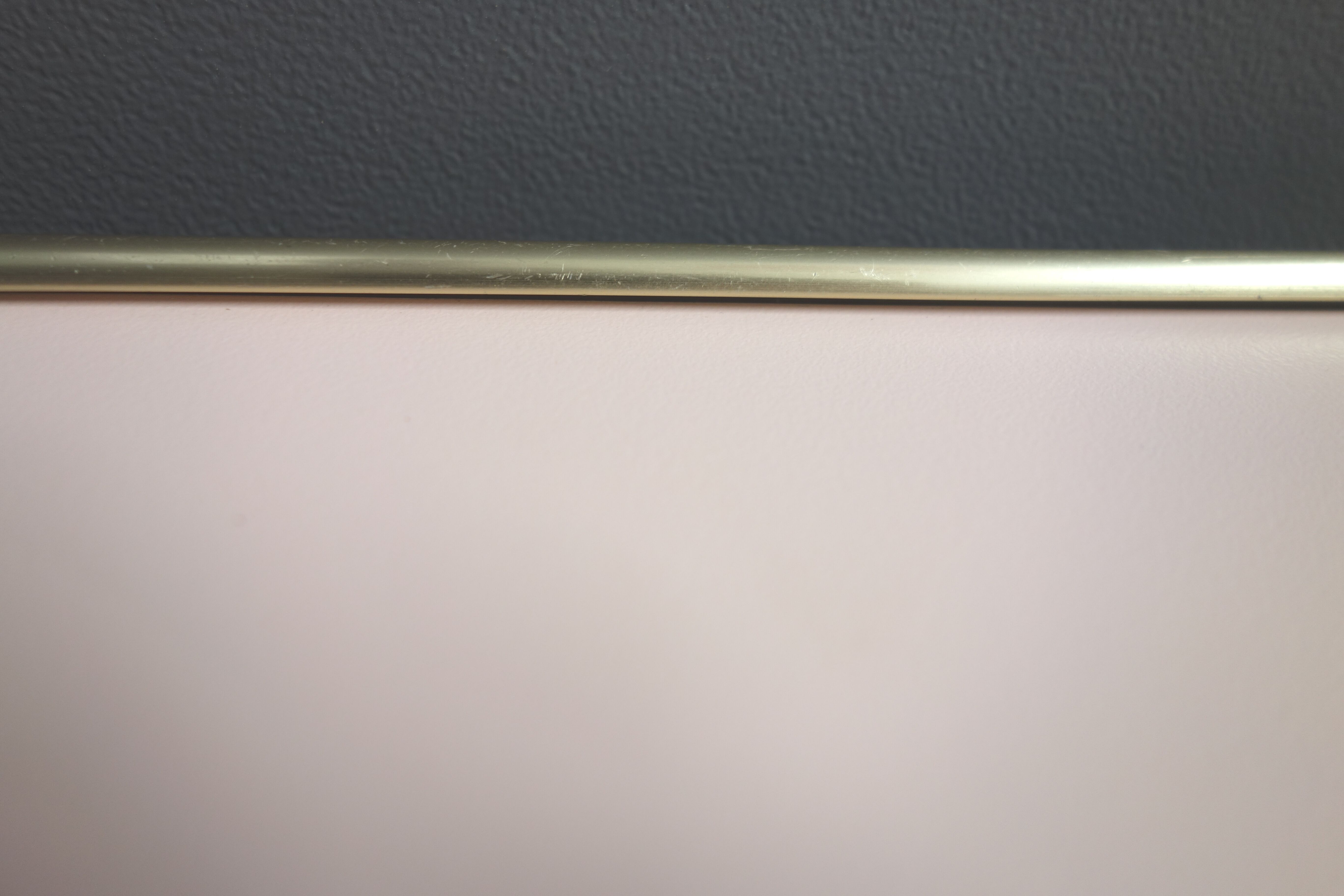 Pink formica magazine table 1950s