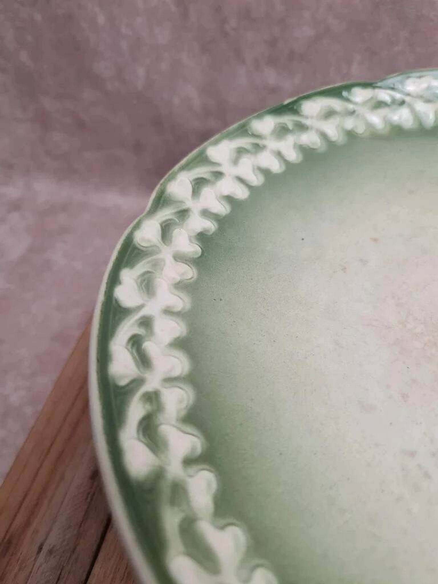 Antique compote stand Lunéville St Clément with green clover decoration.