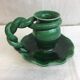 Old candleholder, glazed terracotta cellar, artisanal green color