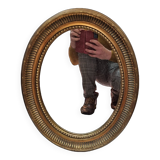 Oval wooden mirror, gold 49x39cm
