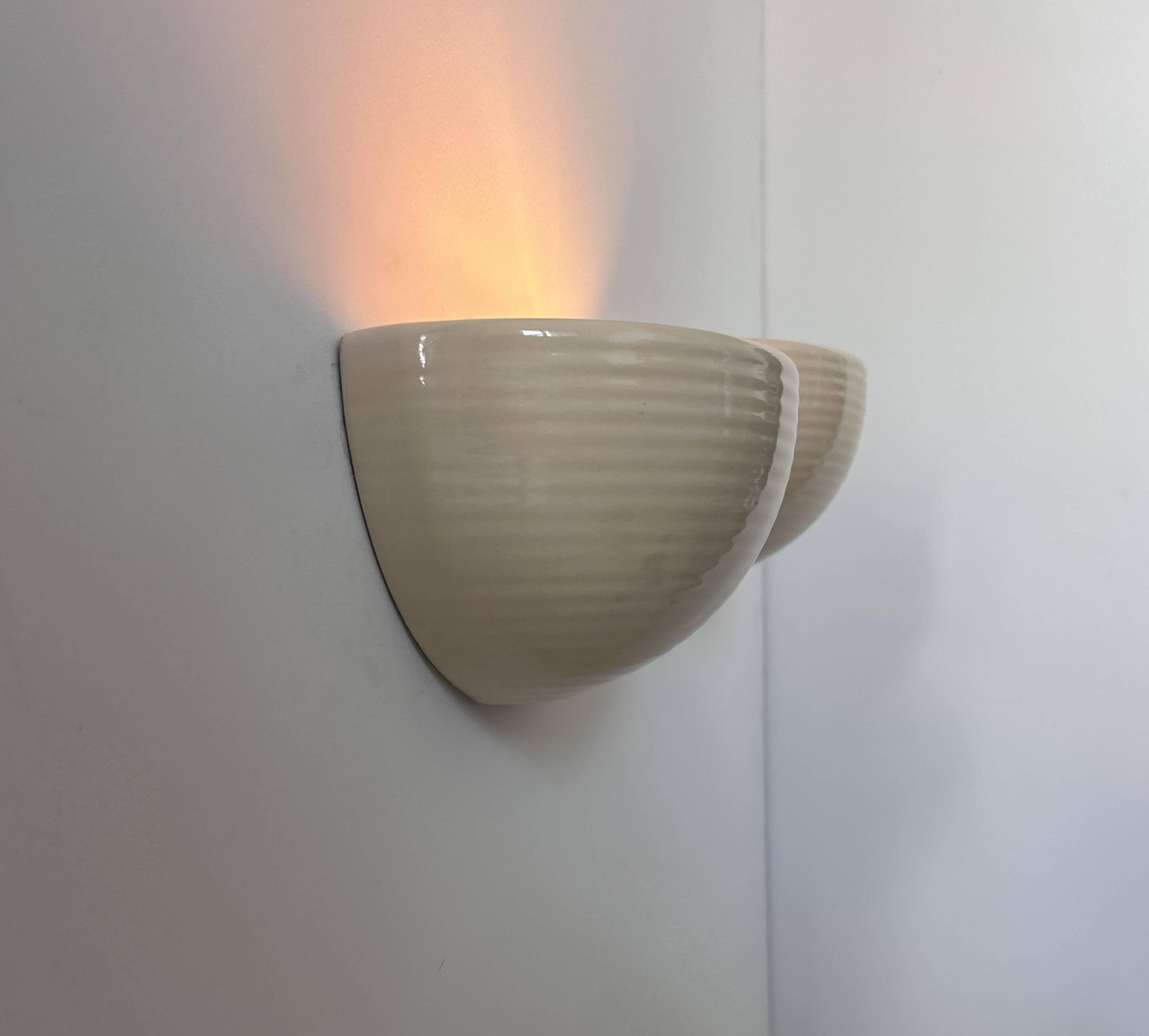 Pair of vintage wall lights, beige porcelain, France 1970