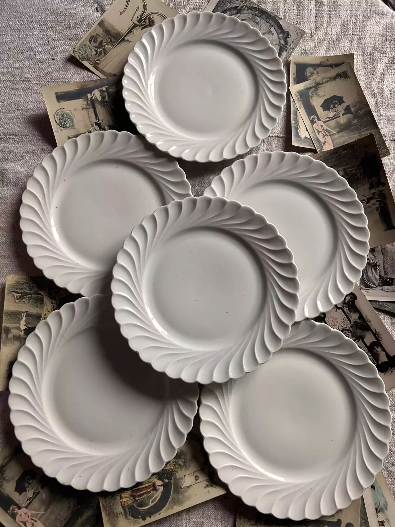 Set of 6 antique twisted white porcelain plates, a beautiful timeless classic.