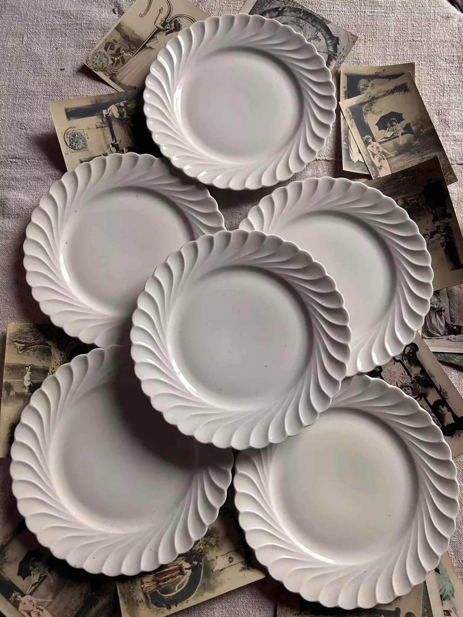 Set of 6 antique twisted white porcelain plates, a beautiful timeless classic.