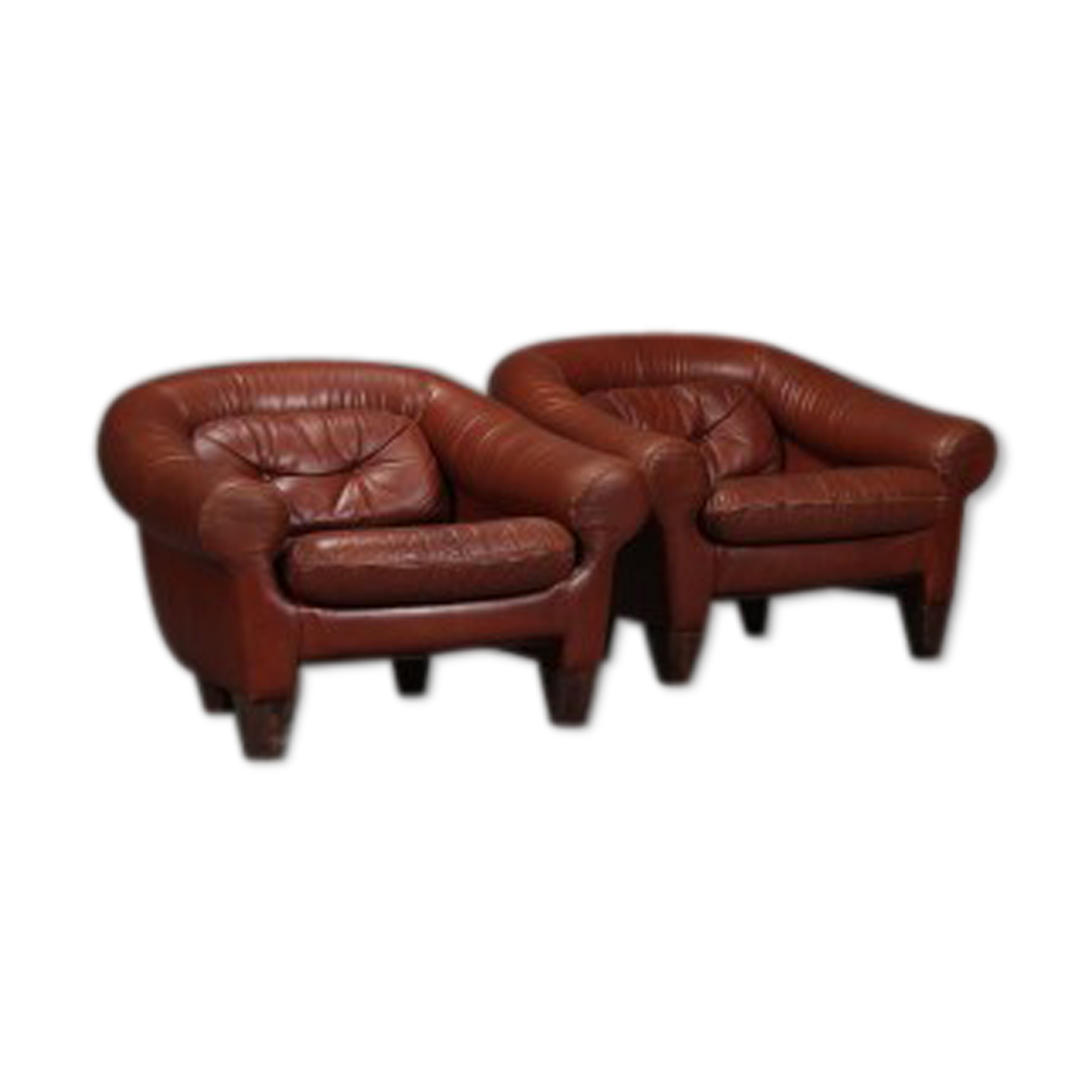Pair of dark caramel leather armchairs