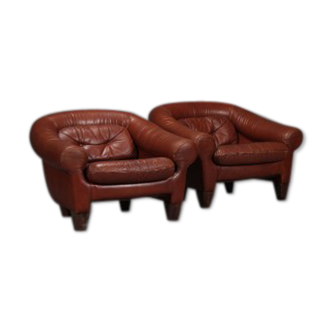 Pair of dark caramel leather armchairs